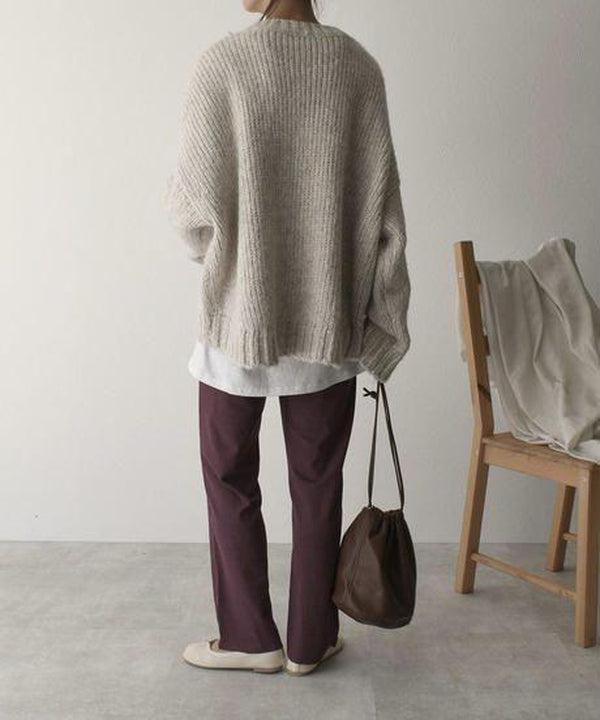 Übergroßer elfenbeinfarbener Pullover mit Vordertasche